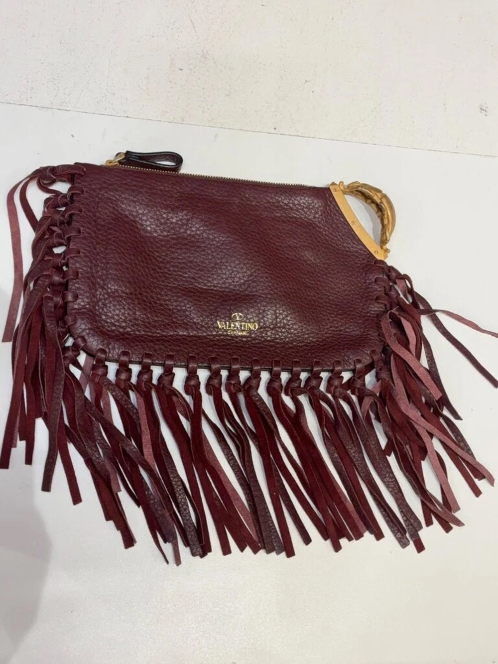 Valentino Burgundy Leather Fringe Wristlet with Gold Accent